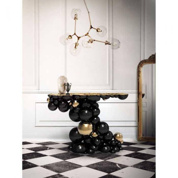 Boca Do Lobo Newton Console: The Newton Console Is A Distinctive And Sculptural Piece That Features Black Lacquered Aluminium And Gold Plated Brass Spheres. The Top Is Made Of Gold Plated Brass. A Portugal Original Craft.51"W x