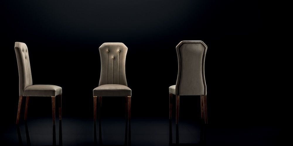 Adora Interiors Diamante Dining Chair: The living room's natural complement is the Diamante chairs. The backrest's shape is reminiscent of a cut diamond, which is the collection's motif.20''L x 20''D x 44''H