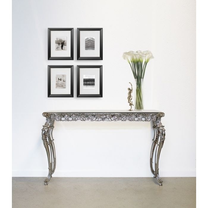 Valente Grace Console Table: The Magic Of Fine European Metal Work At Its Finest!! The Grace Console Table Features Finely Fused Bronze Finished In Nickel With A White Carrera Marble Top. This product is being sold as is from our