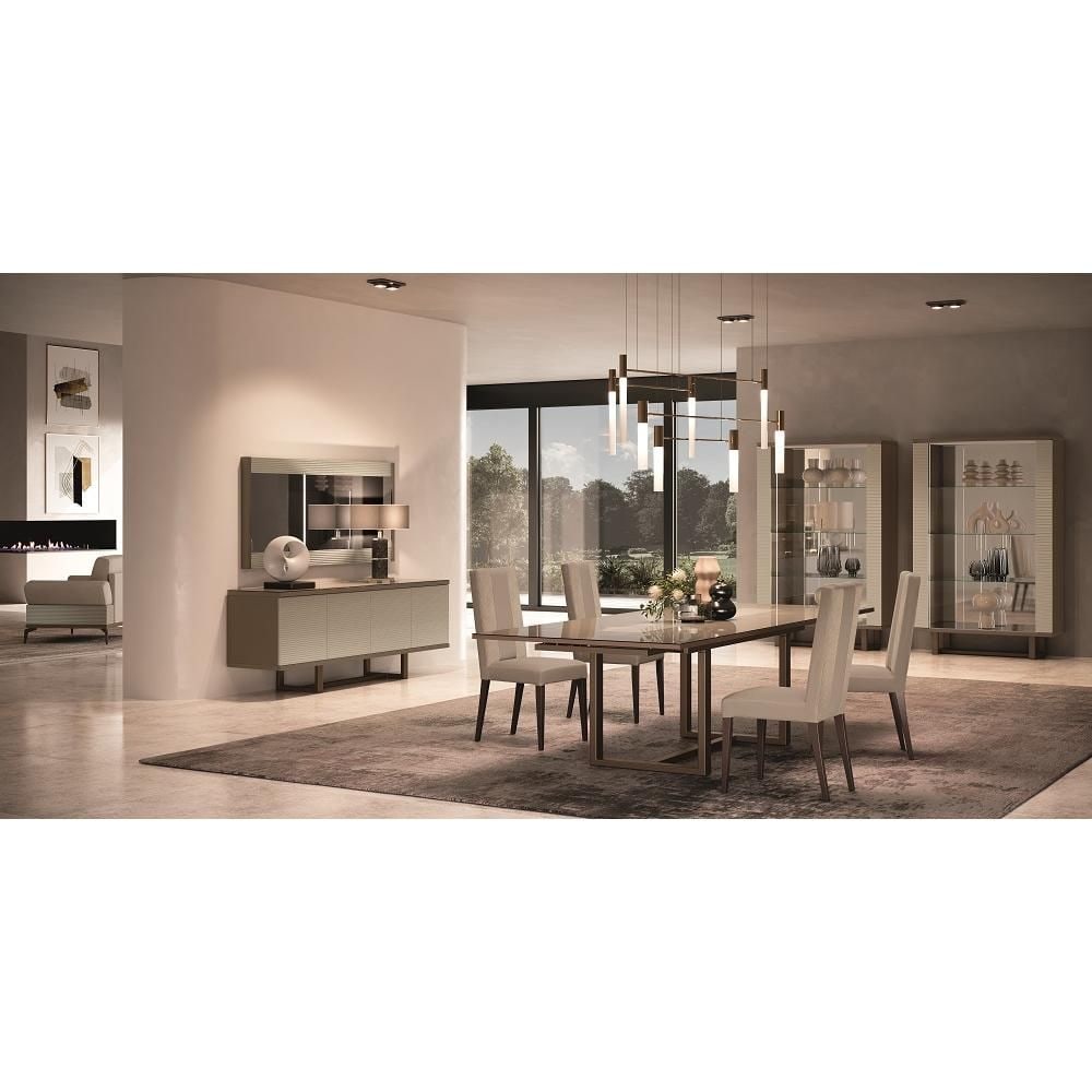Adora Interiors Linea Dining Table With Two Extensions: The Dining Table with Two Extensions from the Linea collection is an ideal addition to any home. Its warm beige color and ribbed surfaces create depth and movement in any room. It features a