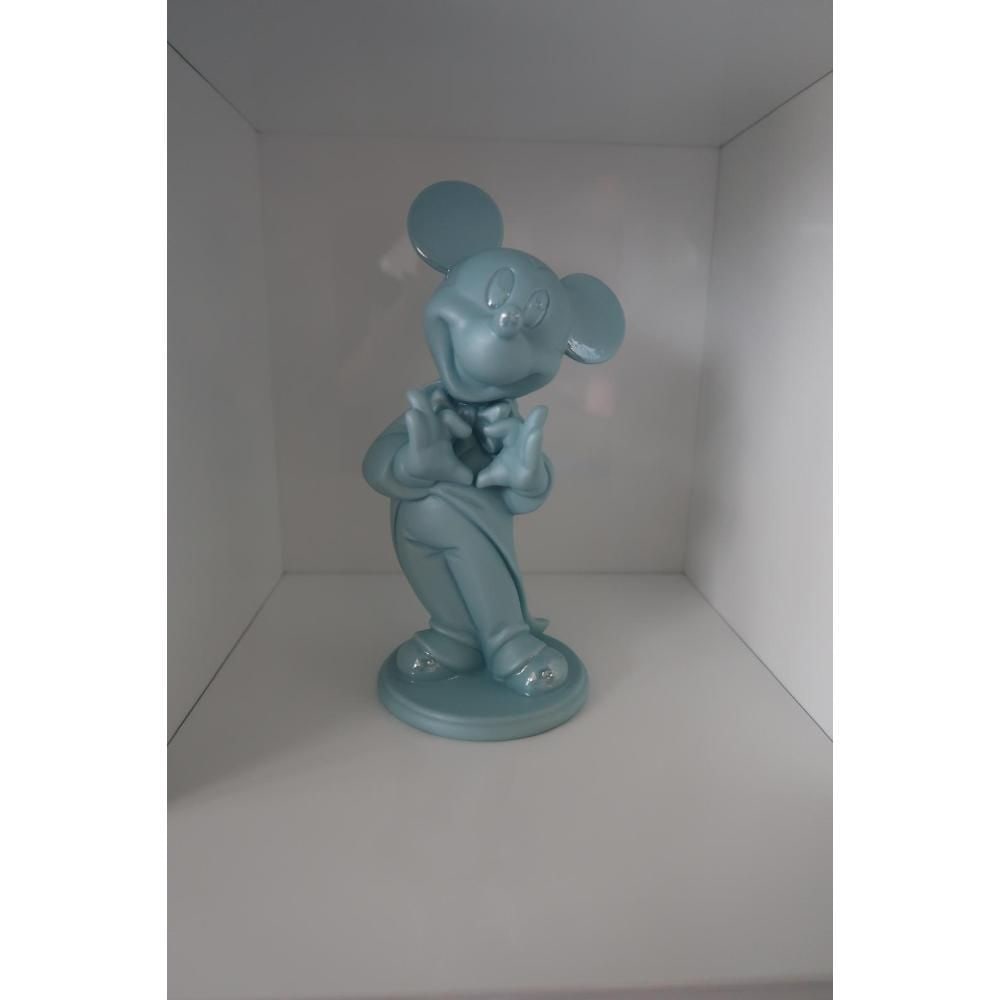 Lladro MM Blue World Of Disney Blue Mickey: This exquisite blue porcelain Mickey Mouse figurine is a timeless collectible that captures the enduring charm of everyone's favorite animated character. Handmade in Spain, the figurine features