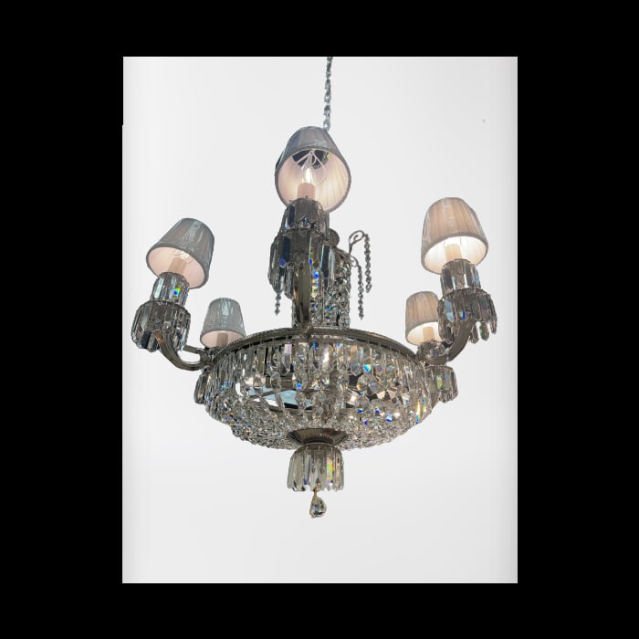 Crystal 6 Light Chandelier: Luxurious Crystal Adorned Six Shade Chandelier with a Silver Finish. This piece is being sold as is from our showroom on clearance. Please Contact Us For More Info.