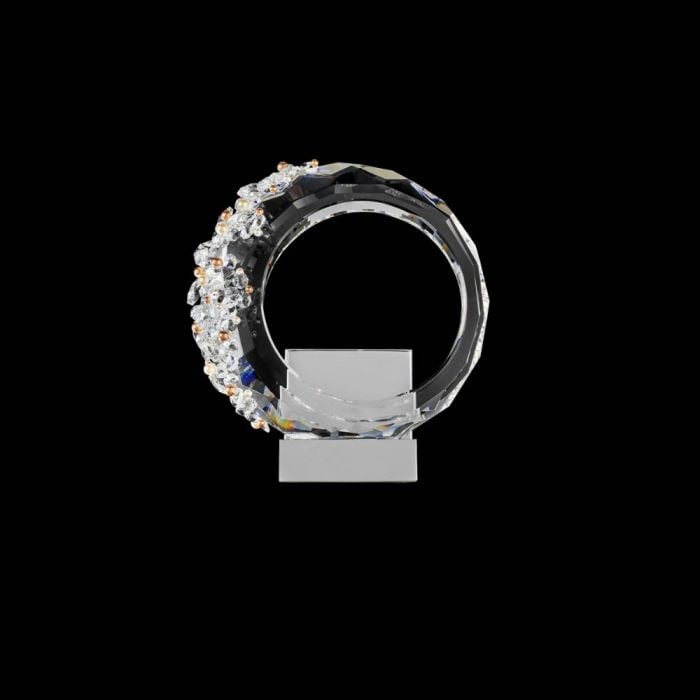 FOREVER SCHONBEK SERENITY SCONCE: The essence of the Serenity Wall Sconce is encapsulated in a glittering faceted ring encircled by Radiance Crystal and gleaming Swarovski Pearls.13''W x 4''D x 14''H