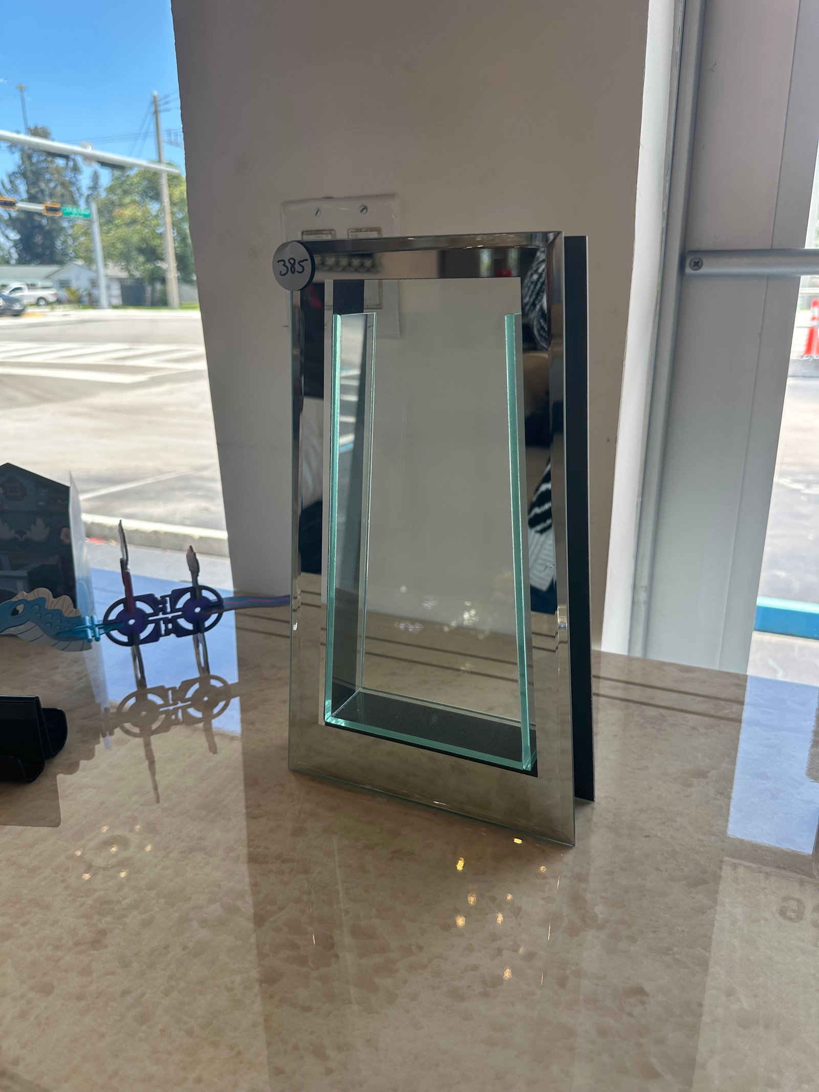 Glass Flower Stand: A Glass Flower Stand to showcase flowers.
