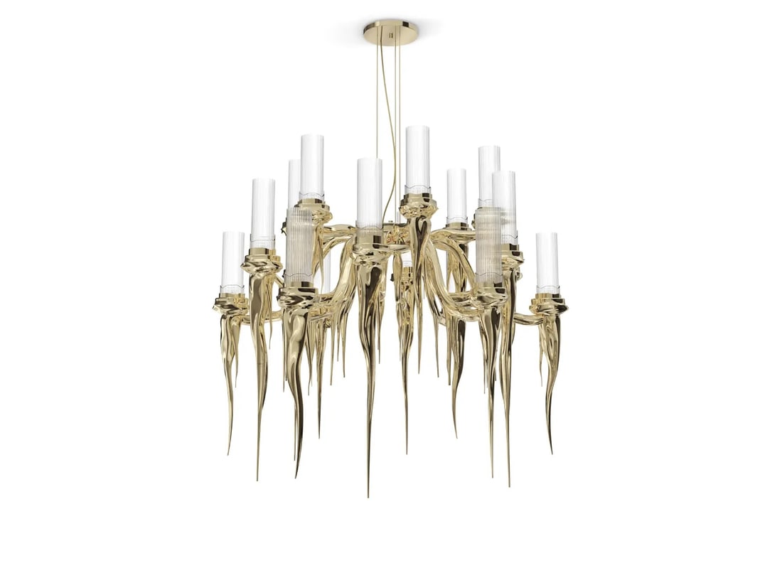 LUXXU WAX CHANDELIER: With its gold-plated brass and handcrafted crystal glass tubes arranged in a flowing pattern, the LUXXU Wax Chandelier has a contemporary classic feel. The chandelier's inventive design creates the