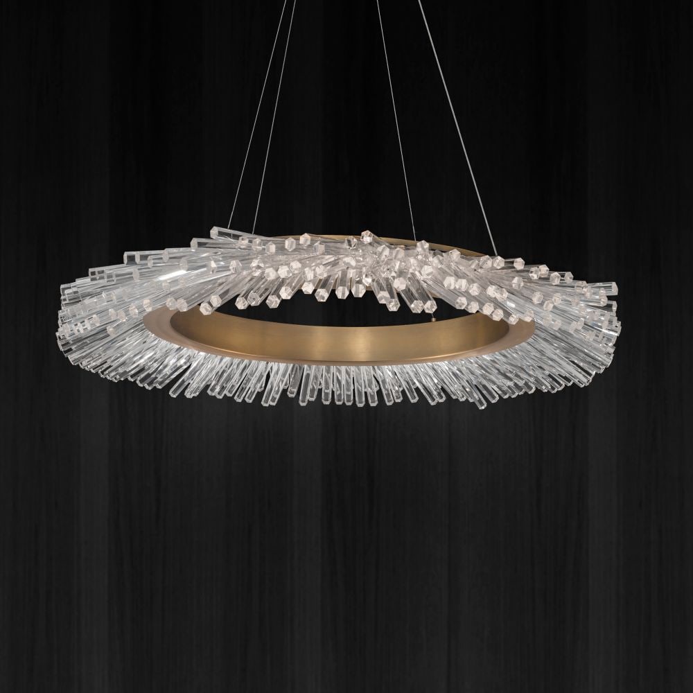 Beyond Schonbek Benediction 37'' Light Brass Pendant: This Benediction Pendant is a calming statement of subtle elegance. The crystals that adorn the ring are reminiscent of cavern stalactites and are illuminated from within with hidden LEDs. Inspiring