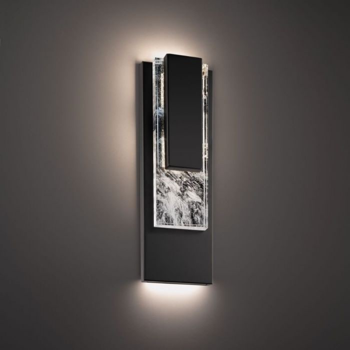 Schonbek Beyond Vail 24'' Wall Sconce: The Vail Wall Sconce features precision cut haze crystal, accented by a frame of matte black metal. The hidden LEDs illuinate and highlight the unique patterns found in the crystal. Made by Schonbek B