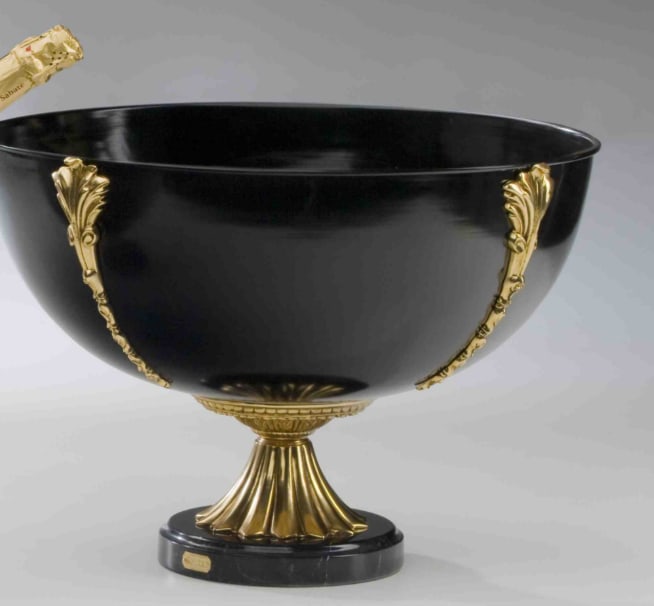 SOHER CHAMPAGNE BUCKET BLACK/GOLD: The most striking elements are seen in the Black Champagne Bucket. Because of the high quality guaranteed by the careful 24 carat gold plating, artistic hand chiseling, and bronze casting, Soher