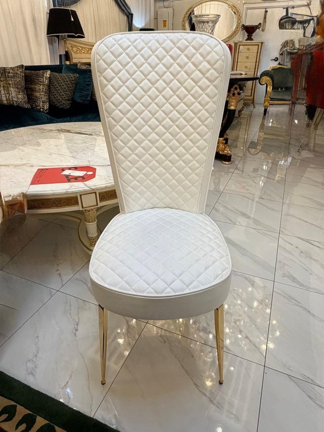 FLORA CHAIR: The Formenti Flora Accent Chair is a Luxurious Handmade Italian Modern Piece Featuring High Gauge Steel Legs and Upholsters in Fine Leather.Dimensions 18"W x 21"D x 41"H