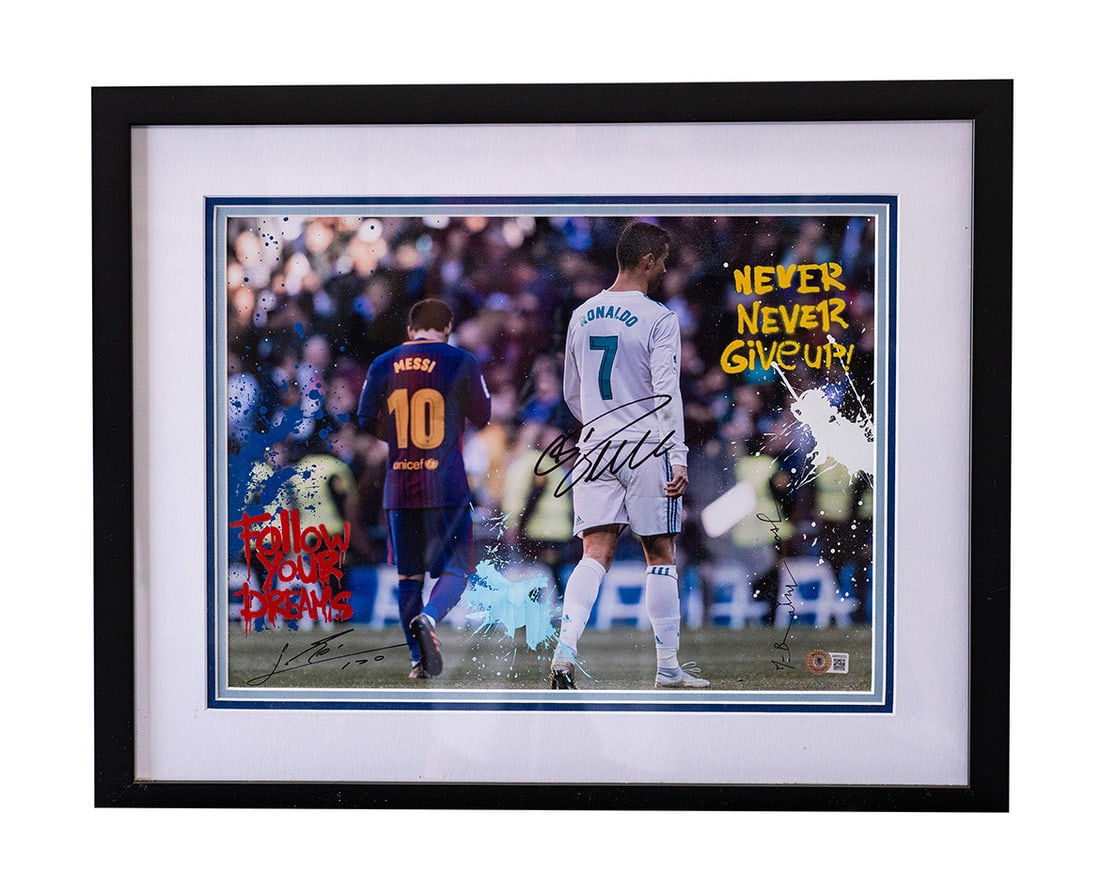 "Messi & Ronaldo" by Mr. Brainwash (French, B.1966) Mixed Media on Paper: his sensational work radiates with the electric energy, vibrant color palette, and iconic street-art bravado of the legendary Neo-Pop artist. The composition centers on one of the most celebrated and 