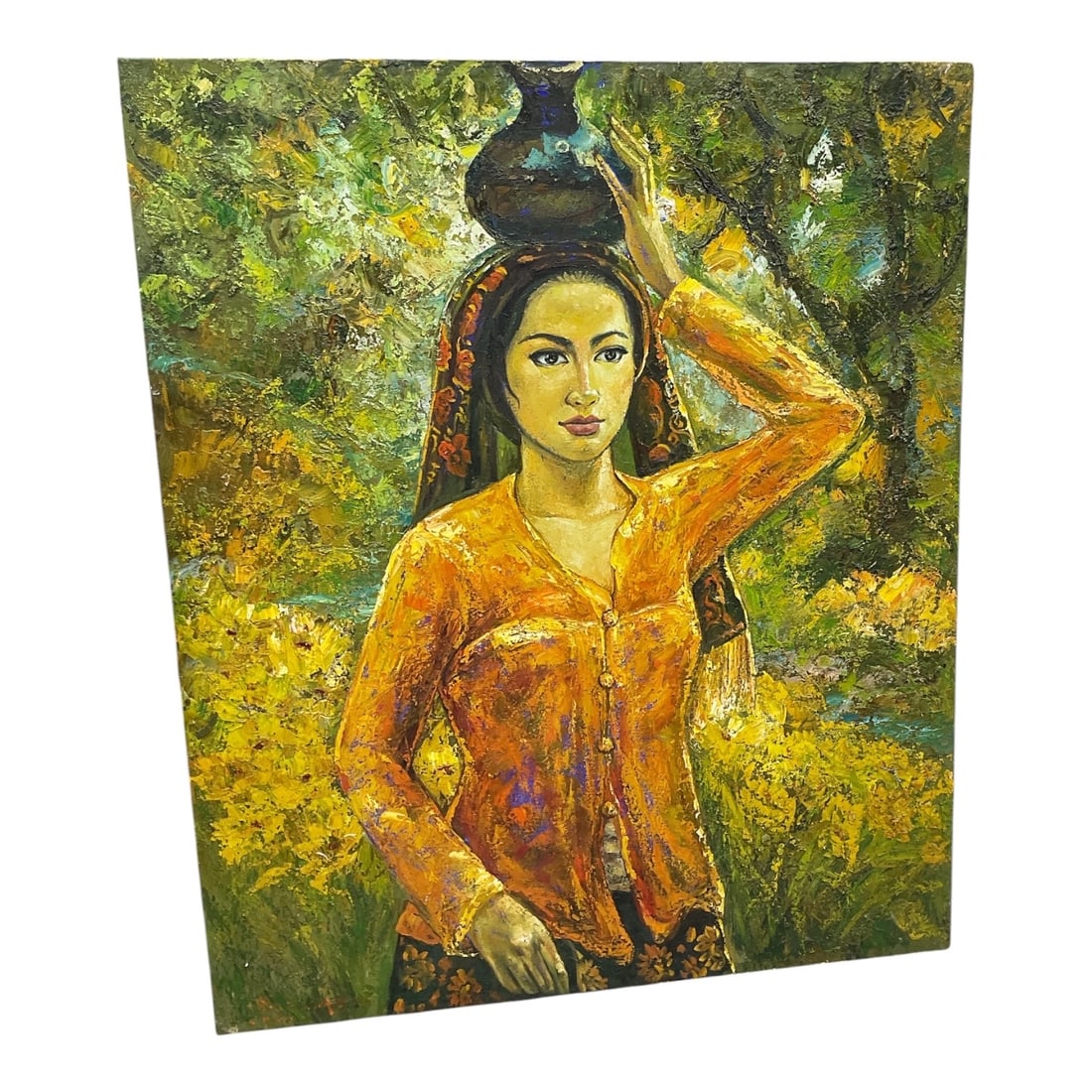 "Balinese Woman with Water Jar" by Penito (Indonesia, 20th Century) Oil on Canvas: A striking and large-scale mid-century figurative painting depicting a Balinese woman in traditional attire, elegantly balancing a dark water vessel atop her head. The subject is rendered with a seren