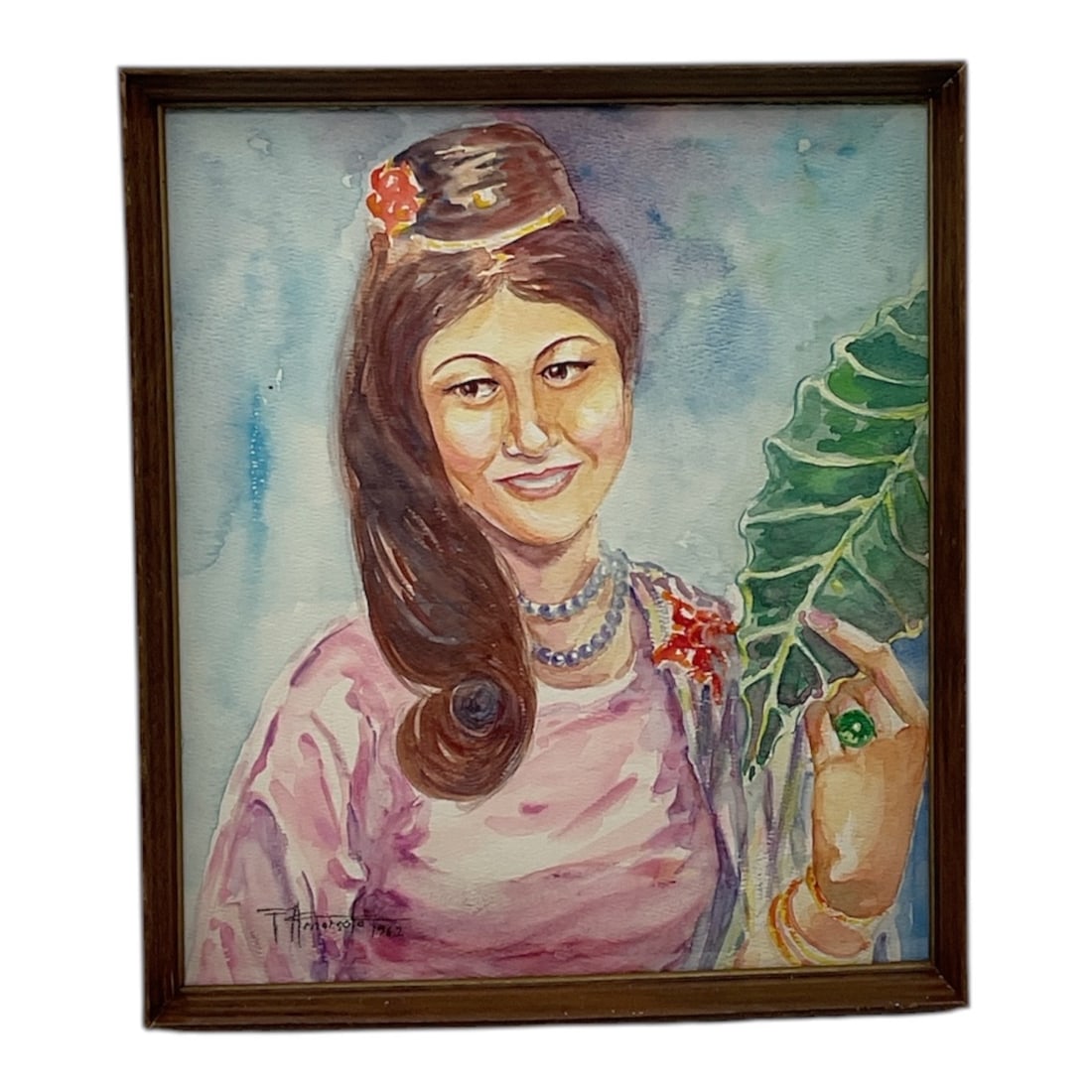 Fernando Amorsolo (Philippines, 1892-1972) Watercolor on Paper: This luminous watercolor portrait is executed in the romanticized, classical style of Fernando Amorsolo, the first National Artist of the Philippines. Known for h