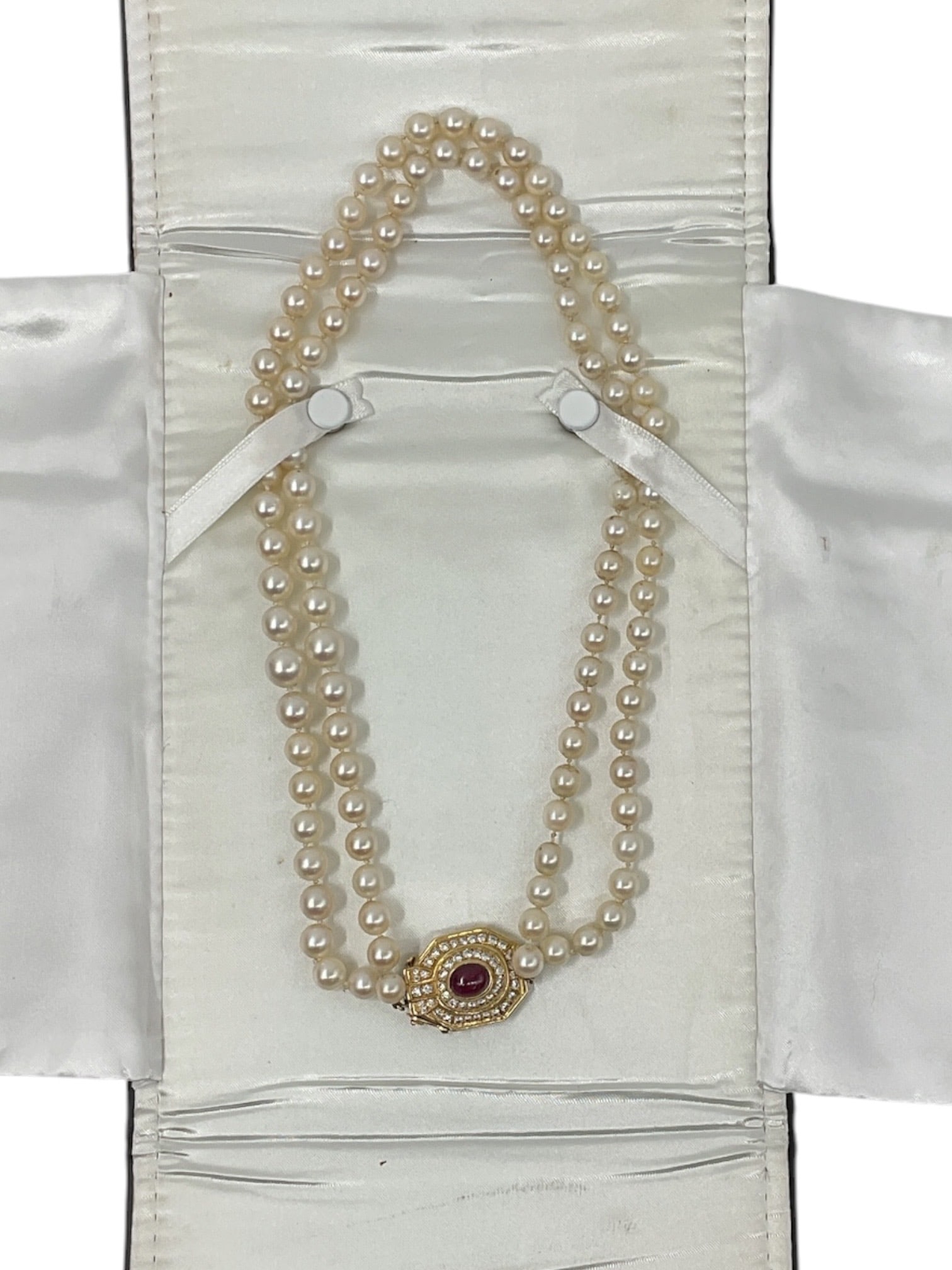 Double Strand Cultured Pearl Necklace with 18kt and 14kt Gold, Ruby, and Diamond Clasp: Specs Materials: Two strands of gra