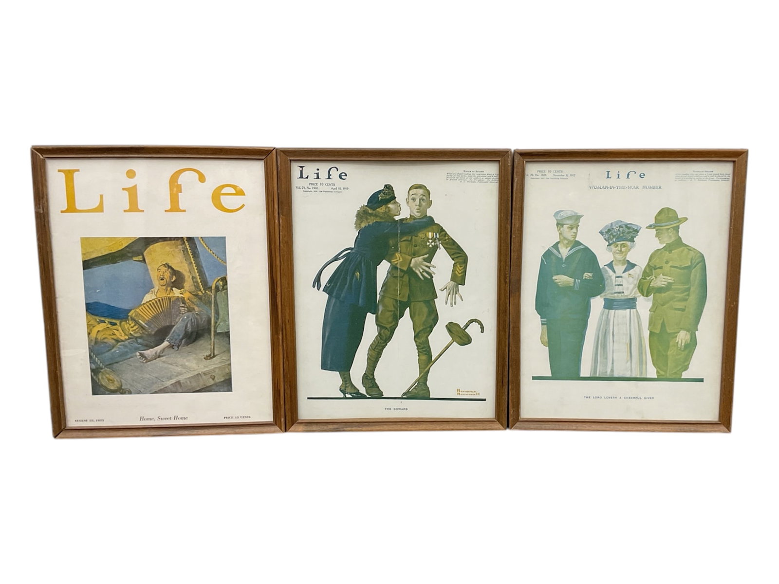 Framed Vintage Life Magazine Covers by Norman Rockwell (USA, 1894-1978) Print on Paper: This lot features three framed Life magazine covers illustrated by Norman Rockwell. The collection includes "Home, Sweet Home" (August 1923) depicting a sailor playing an accordion,