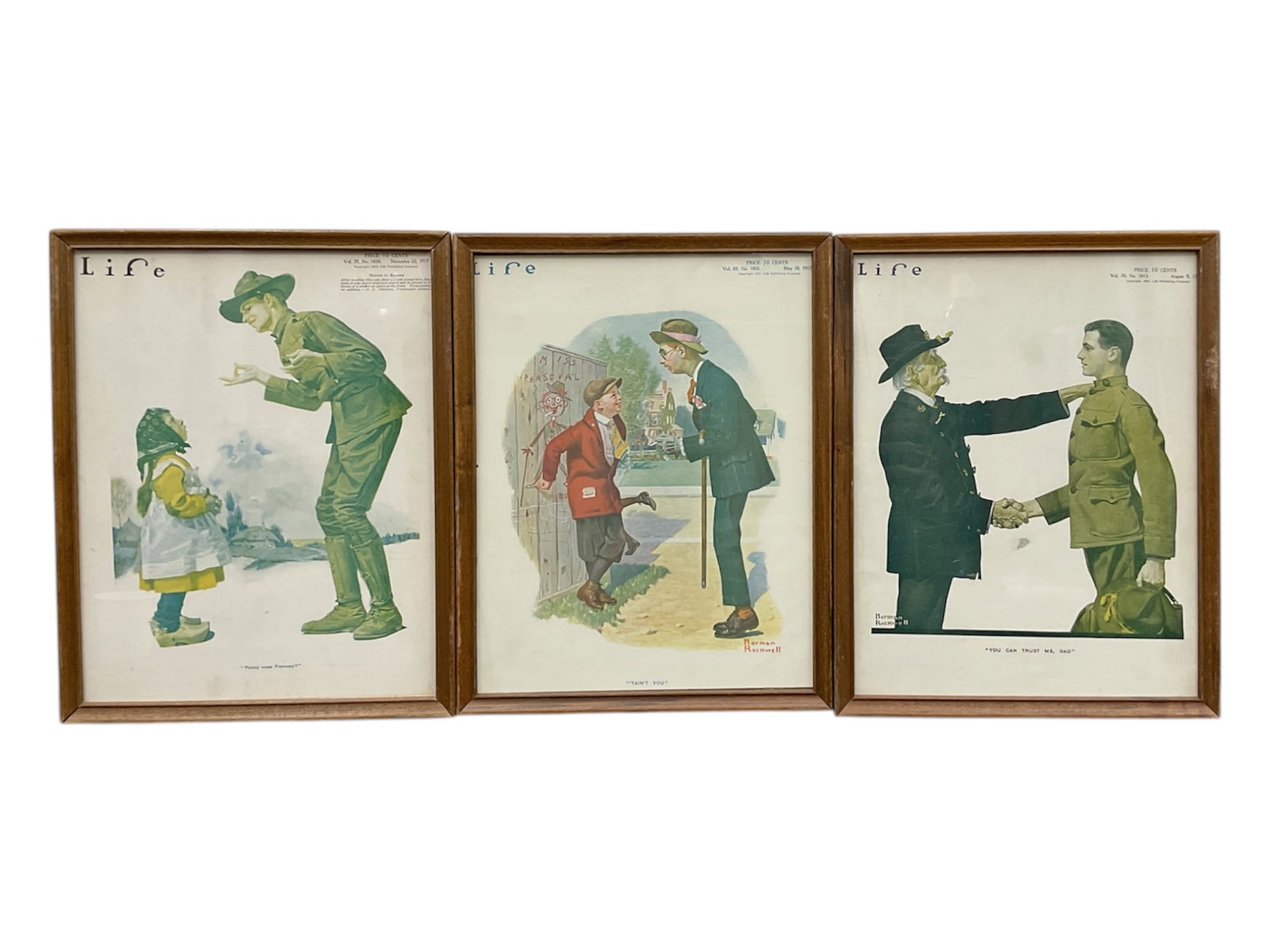 Framed Vintage Life Magazine Covers by Norman Rockwell (USA, 1894-1978) Print on Paper: This lot features three framed Life magazine covers illustrated by Norman Rockwell. The collection includes "Parley-voo Francey?" (November 1917) depicting a soldier interacting with a