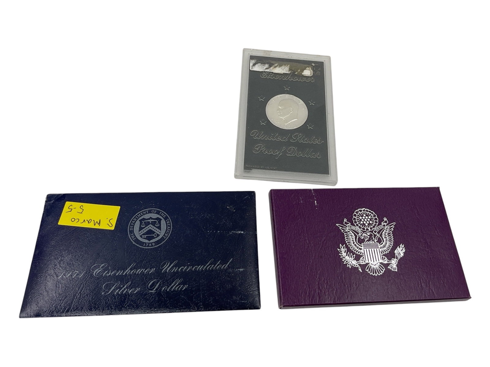 "U.S. Mint Coin Collection" (1971–1992) Eisenhower Silver Dollars & Proof Set: A collection of United States commemorative coin and proof sets, including silver commemorative dollars, proof coin sets, and mint-issued presentation packaging. The grouping includes original