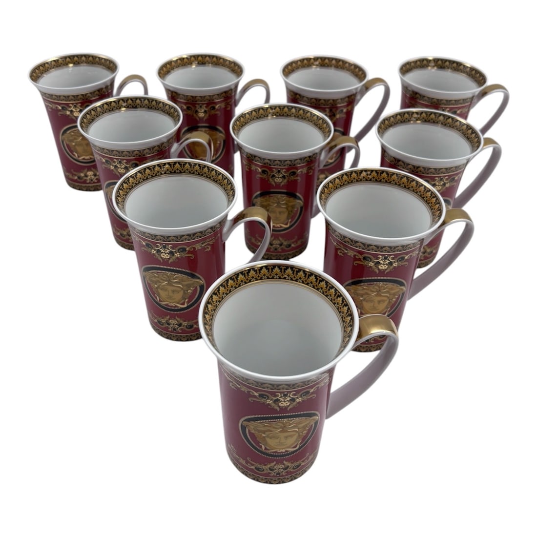 A magnificent set of ten (10) Versace Rosenthal Medusa mugs: A magnificent set of ten (10) Versace Rosenthal Medusa mugs, representing the iconic collaboration between the esteemed German porcelain manufacturer Rosenthal and the legendary Italian fashion house