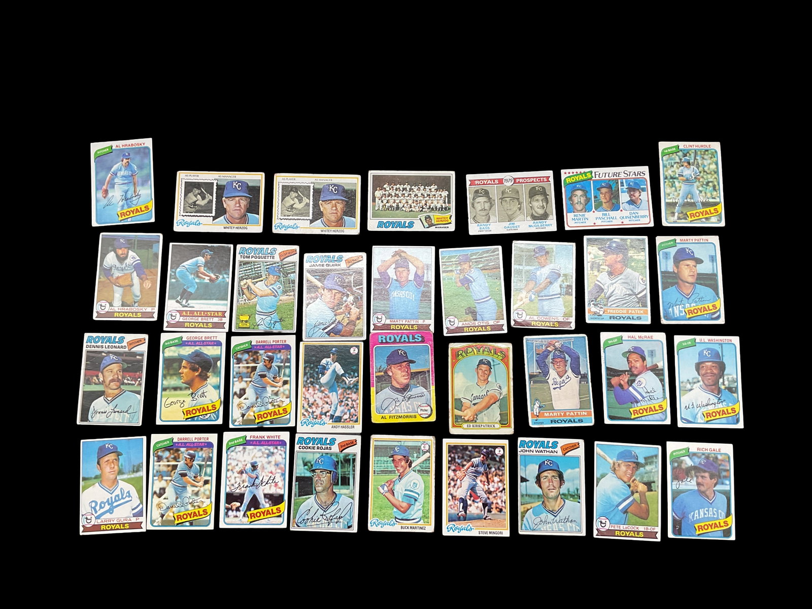 Kansas City Royals Baseball Card Collection Lot: Collection of Kansas City Royals baseball trading cards featuring a range of players, card designs, and production eras. This lot includes individual player cards with a mix of action shots, posed por