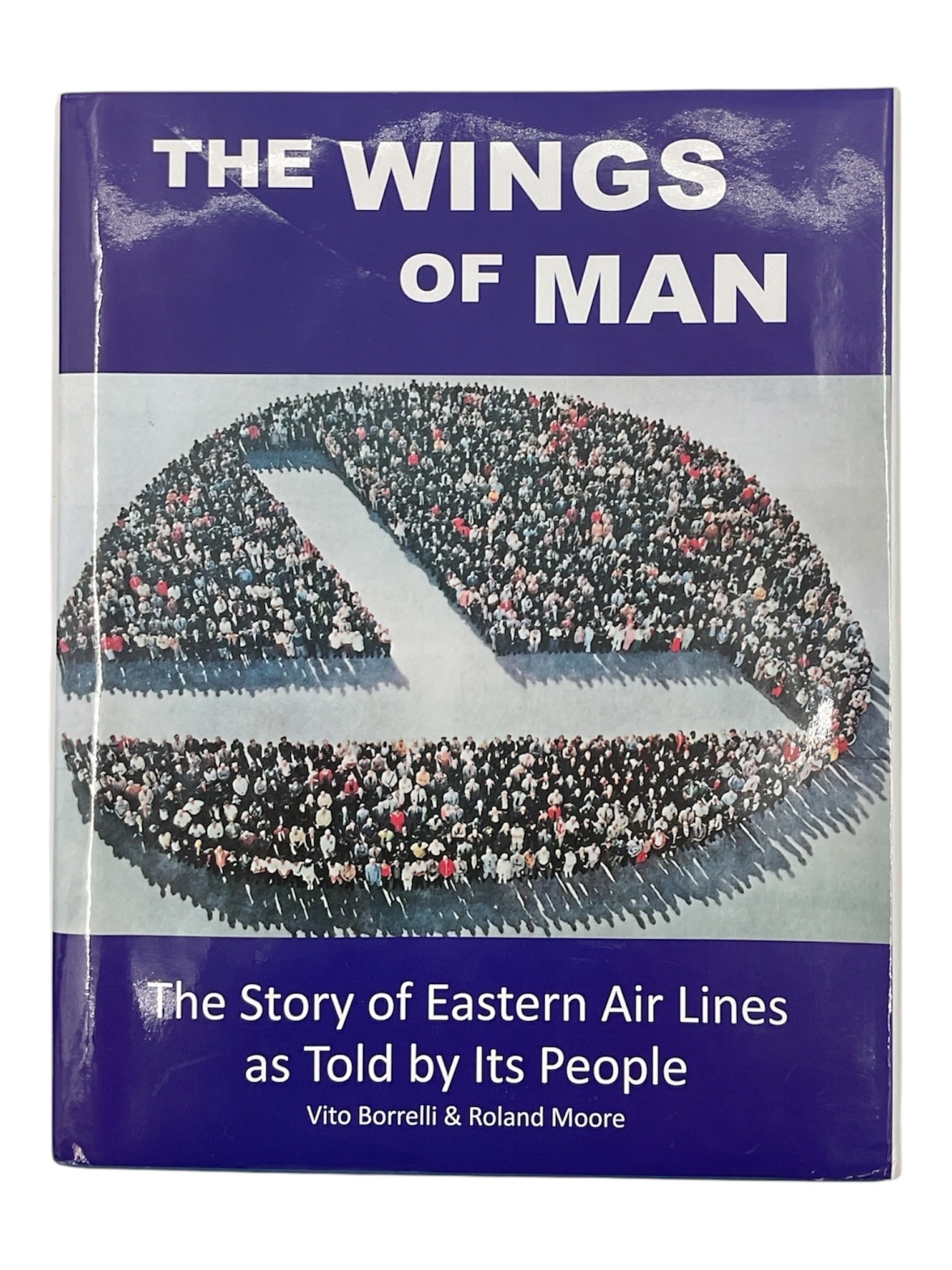 The Wings of Man: The Story of Eastern Air Lines as Told by Its People: Hardcover edition of The Wings of Man: The Story of Eastern Air Lines as Told by Its People by Vito Borelli and Roland Moore, published in 2015. This comprehensive volume chronicles the history and le