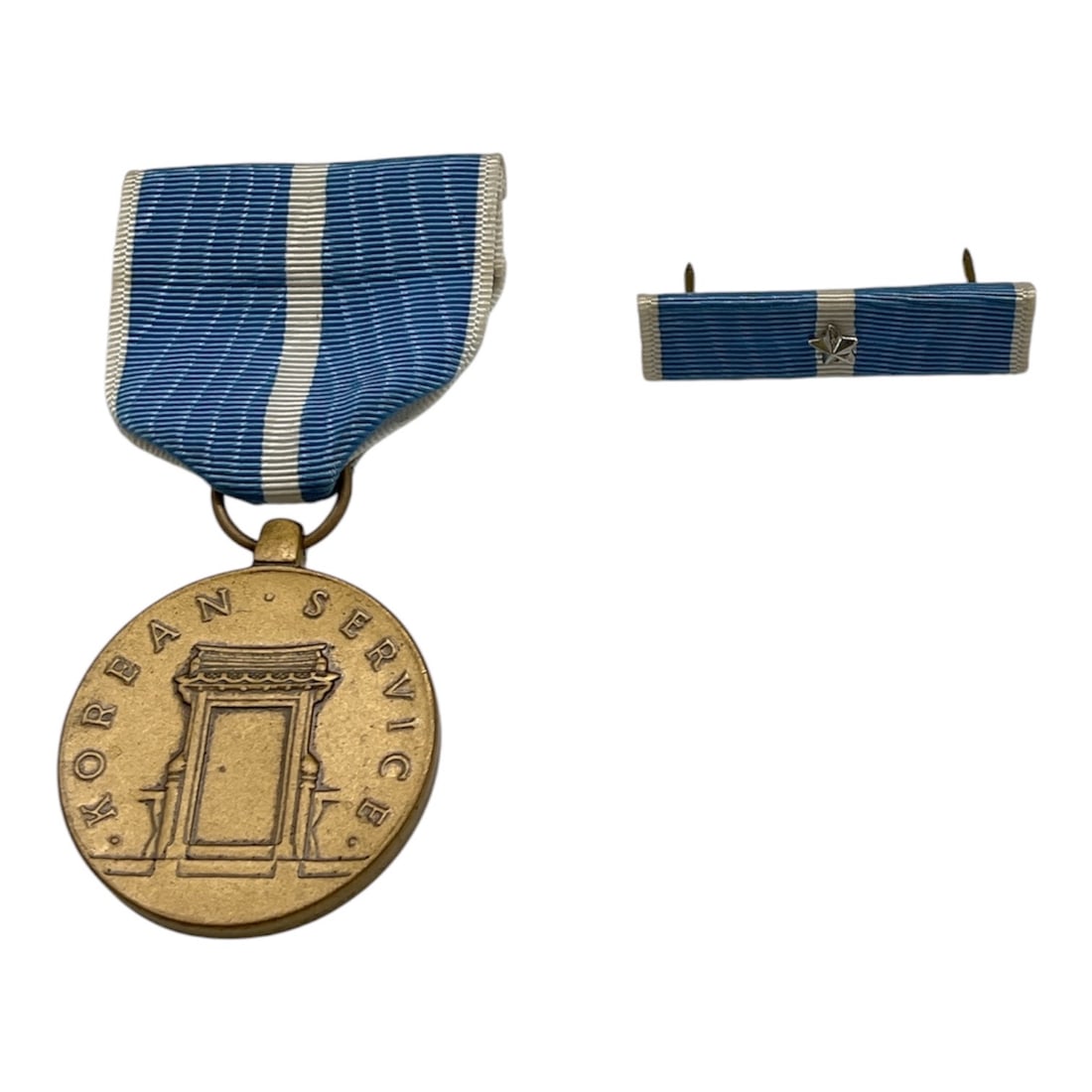 United States Korean Service Medal with Ribbon Bar: United States Korean Service Medal and matching ribbon bar awarded for military service during the Korean War. The medal was issued to members of the U.S. Armed Forces for service in Korea between Jun