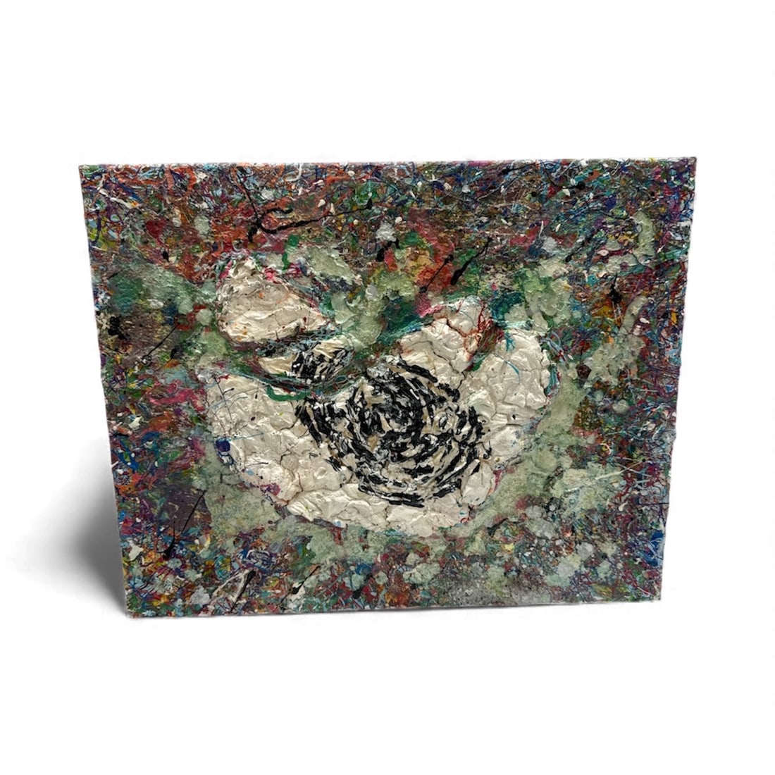 Pingo Central Spiral Relief: A dynamic abstract work featuring a textured white relief at center, encircling a bold black spiral motif. Surrounding layers of dense color—greens, reds, blues, and metallic