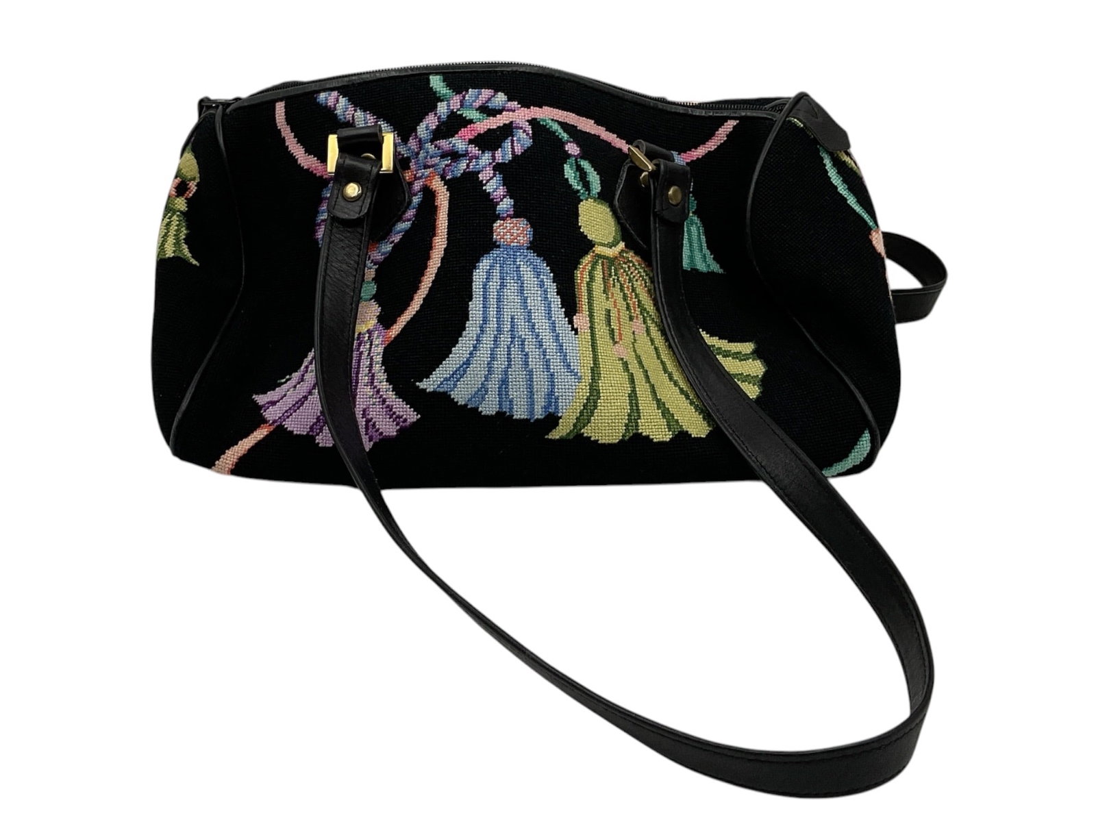 Elizabeth Turner Needlepoint Tassel Motif Handbag: Vintage Elizabeth Turner handbag featuring colorful needlepoint tassel and medallion motifs on a black ground with black leather handles and trim. Includes zip-top closure and fabric-lined interior