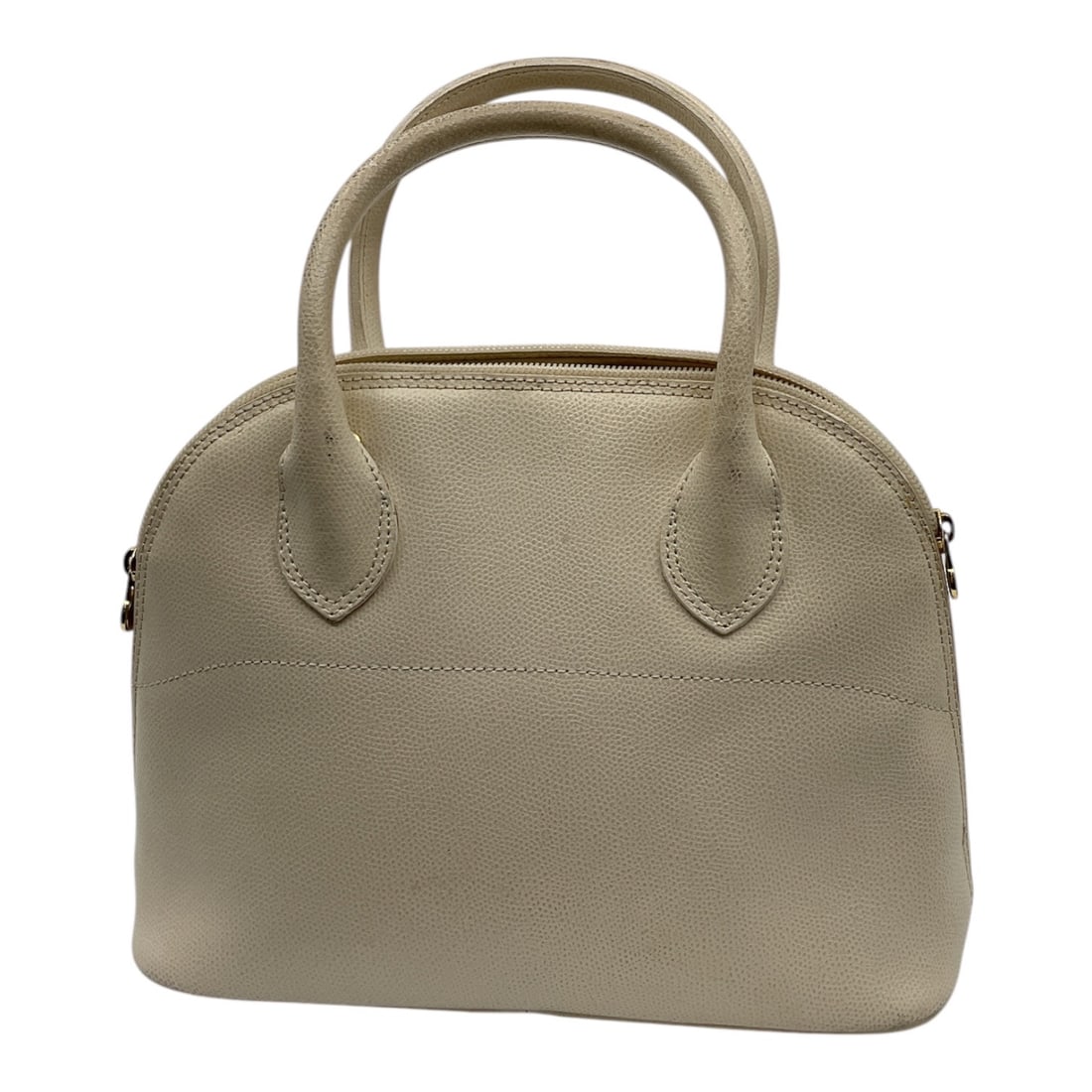 Harrods Cream Pebbled Leather Handbag: Designer Harrods handbag crafted in cream pebbled leather with structured dome silhouette and dual rolled handles. Features gold-tone interior plaque marked Harrods and zip-top closure. Elegant