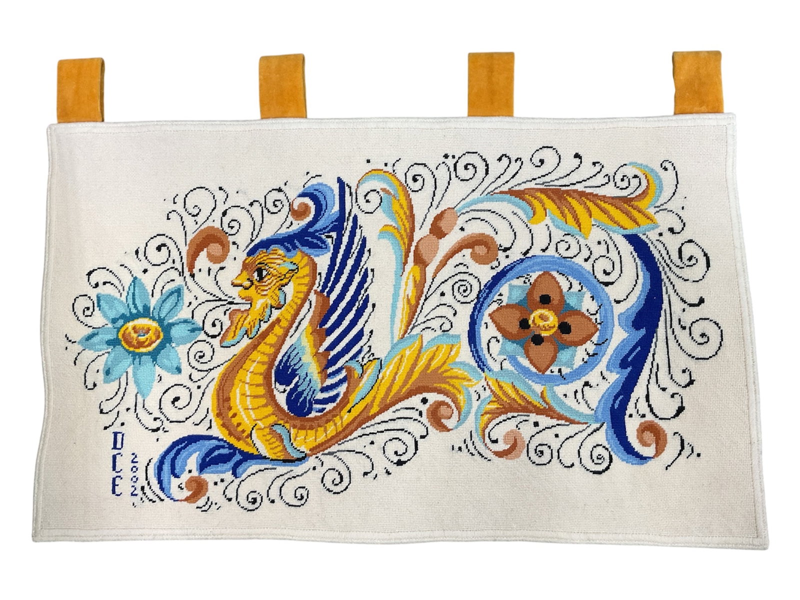 Signed DCE Needlepoint Dragon Textile Wall Hanging, Dated 2022: Colorful contemporary needlepoint textile wall hanging featuring a stylized dragon surrounded by scrolling decorative motifs and floral elements in vibrant shades of blue, gold, brown, and black. Hand