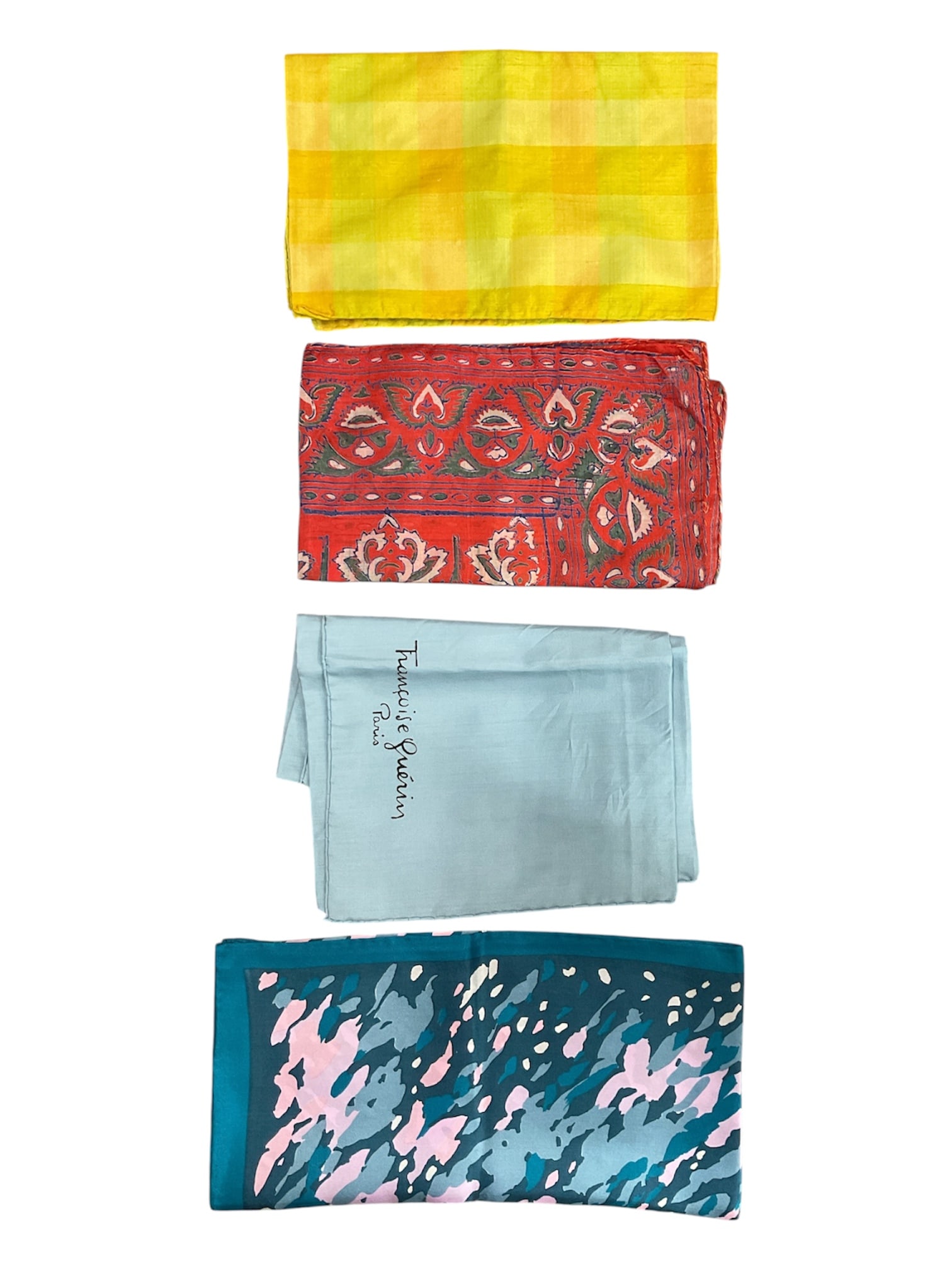 Group of Four Vintage Designer and Patterned Handkerchiefs: Collection of four vintage handkerchiefs and scarves in assorted patterns and colors. Includes an abstract teal and white print scarf, a red paisley-style floral print handkerchief, a yellow plaid rec