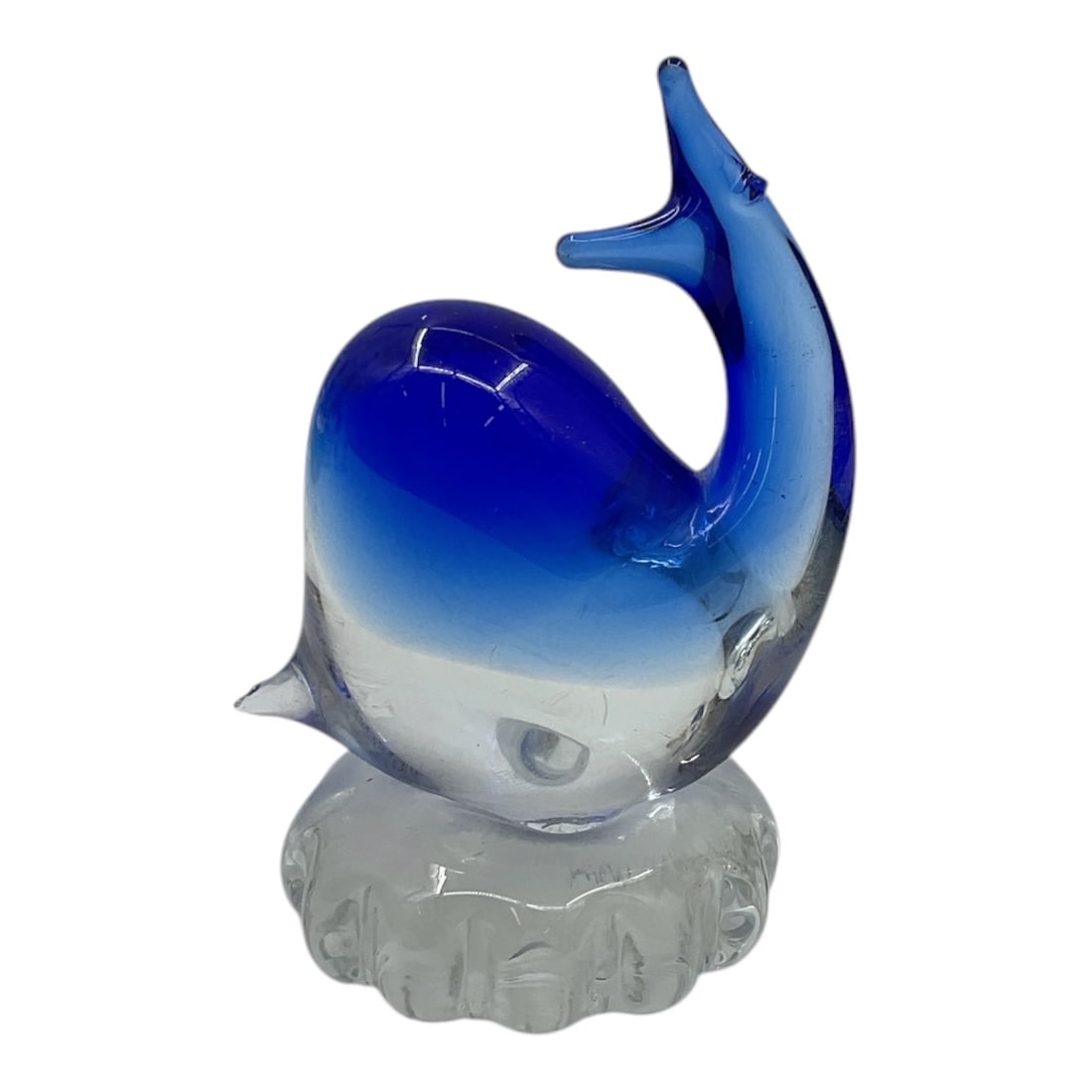 Blue and Clear Art Glass Fish Figurine: Decorative art glass fish figurine featuring a cobalt blue to clear gradient body with stylized curved form and textured clear base. Elegant modernist aquatic sculpture with smooth polished finish