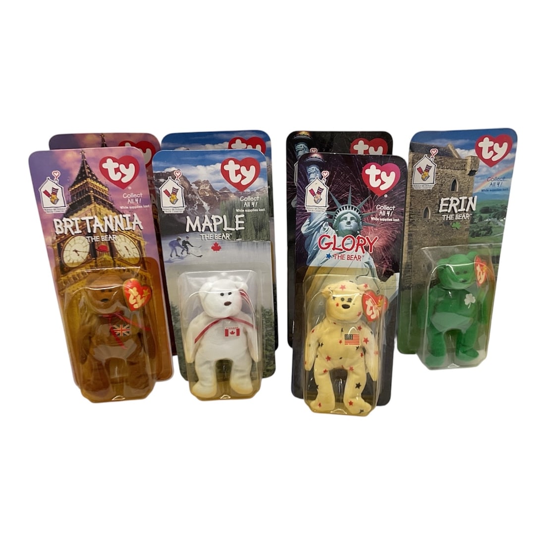 Lot of 7 Ty Beanie Babies McDonald's Teenie Beanies in Package: Group of seven Ty Beanie Babies McDonald’s Teenie Beanies figures, each still sealed in its original blister packaging. The lot includes various characters such as Britannia, Maple, Glory, and