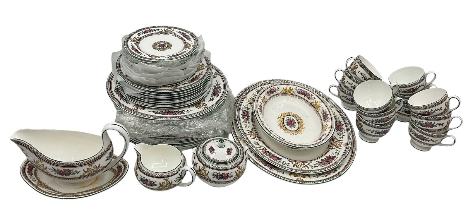 Wedgwood Columbia W595 Bone China Partial Dinner Service: Extensive Wedgwood bone china partial dinner service in the Columbia W595 pattern featuring black, rust, and gilt classical border decoration on white ground. Marked Wedgwood Bone China Made in Englan
