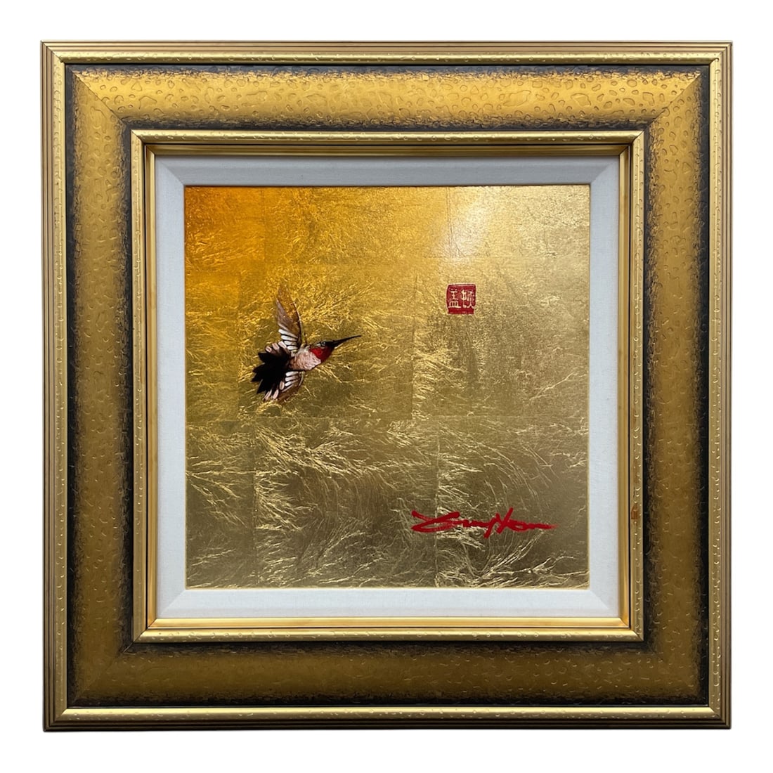 Patrick Guyton Hummingbird on Gold Leaf: Contemporary mixed media painting depicting a hummingbird in flight against a textured gold leaf ground. Signed in red lower right and featuring an artist seal mark upper right. Presented in an