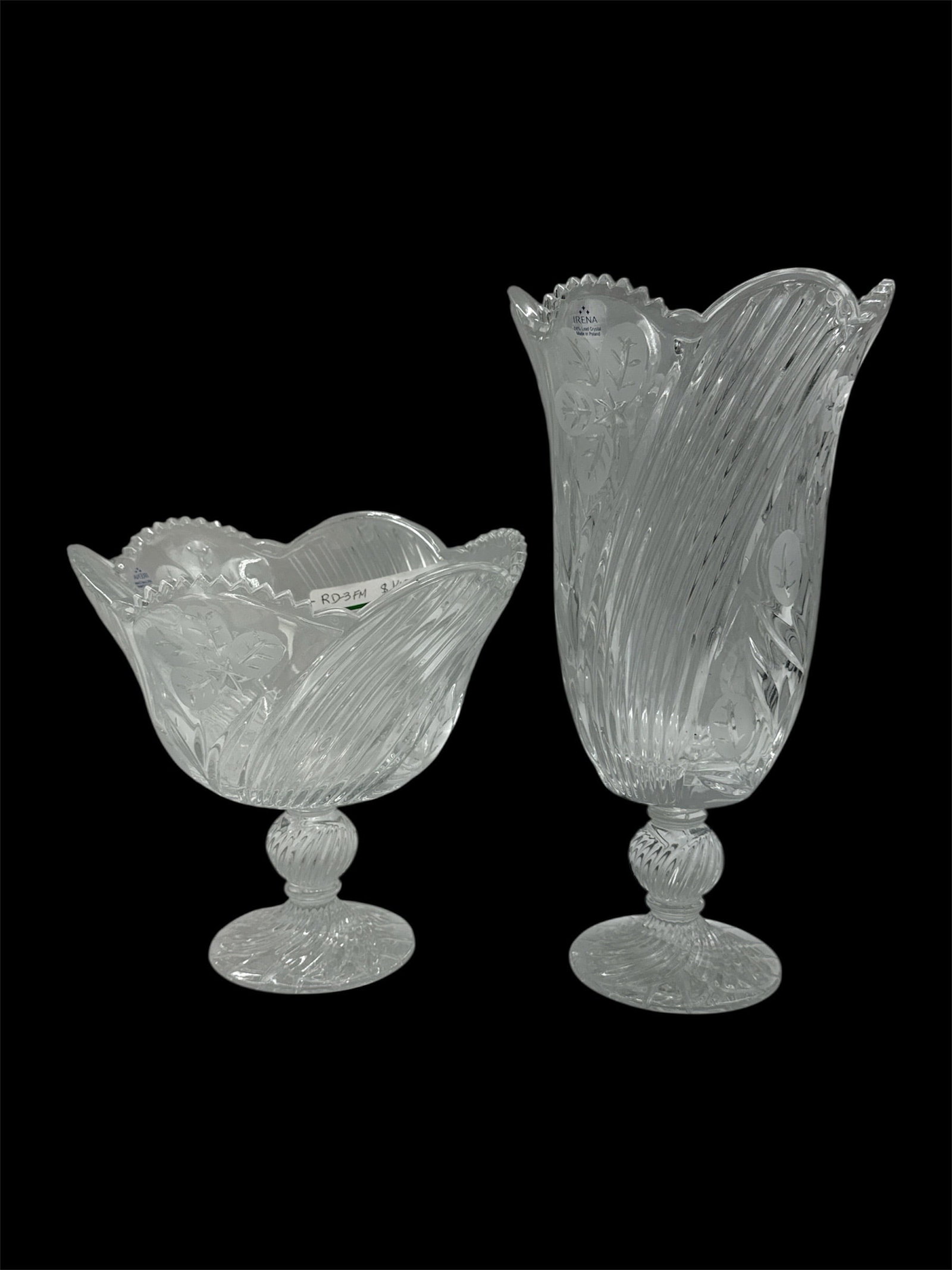 Pair of Etched Glass Pedestal Vases with Scalloped Rim: Elegant pair of clear etched glass vases featuring flowing vertical ribbed detailing and flared scalloped rims. Each vase is raised on a decorative pedestal base with faceted accents, enhancing their 