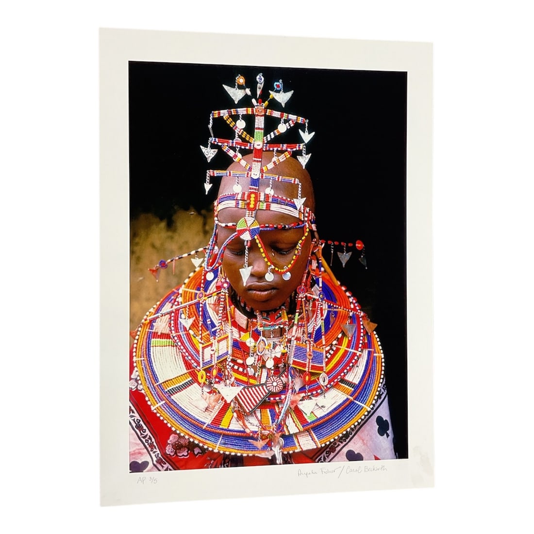 "Mursi Woman with Lip Plate, Ethiopia" by Carol Beckwith (USA, B.1945) and Angela Fisher (Australia,: This color photograph captures a Mursi woman in the Omo Valley of Ethiopia, wearing a traditional clay lip plate and an elaborate beaded headdress. The Mursi are known for these distinctive cultural p
