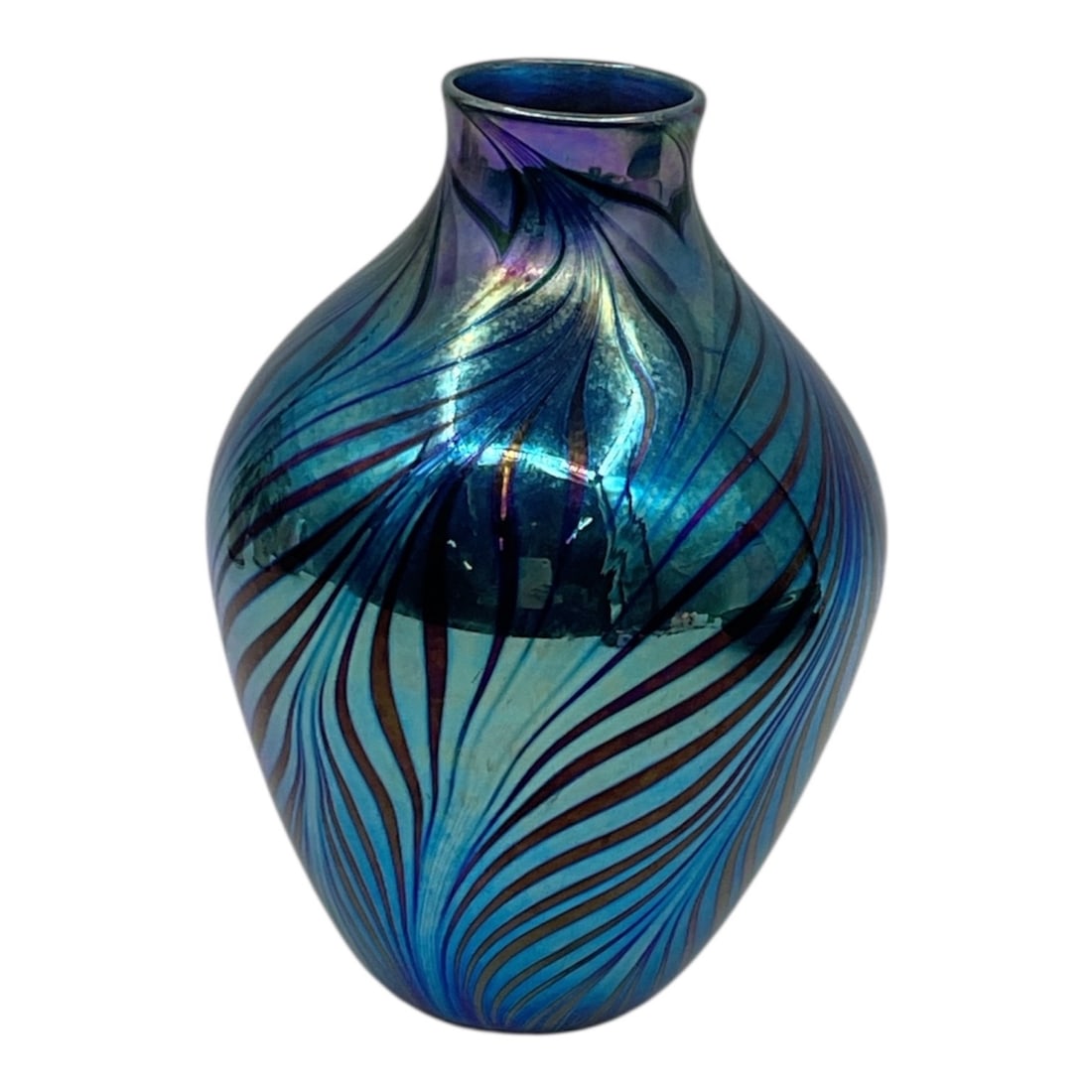 "Iridescent Blue Feathered Vase" by Tim Murray (England, b.1948) Hand-Blown Art Glass: Description: Contemporary hand-blown studio art glass vase by Tim Murray, featuring a striking iridescent blue surface with a pulled feathered or "sheaf" pattern in contrasting bronze and am
