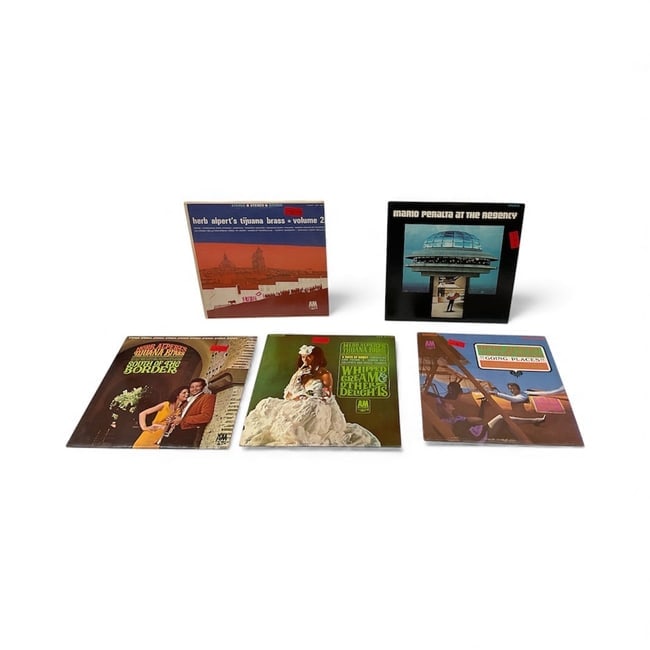 5 Vintage Latin and Easy Listening Vinyl Albums Including Herb Alpert and Mario Peralta: This collection includes five vintage vinyl albums featuring four releases by Herb Alpert and the Tijuana Brass along with one album by Mario Peralta. The Herb Alpert selections represent classic