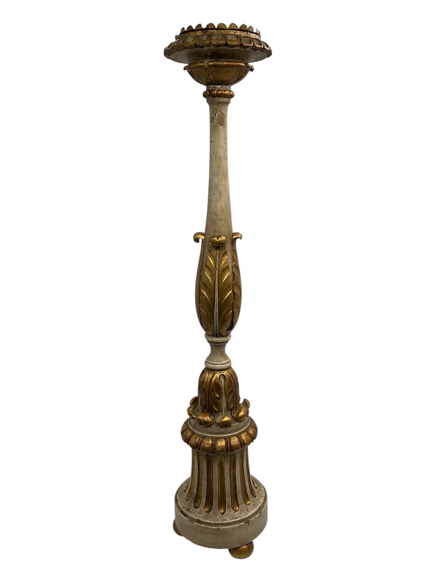 19th Century Spanish Colonial Carved Polychrome Wood Church Candleholder: A 19th century Spanish Colonial carved wooden candleholder originating from a Peruvian church. The tall ecclesiastical form features a richly carved column rising from a decorative base with fluted an