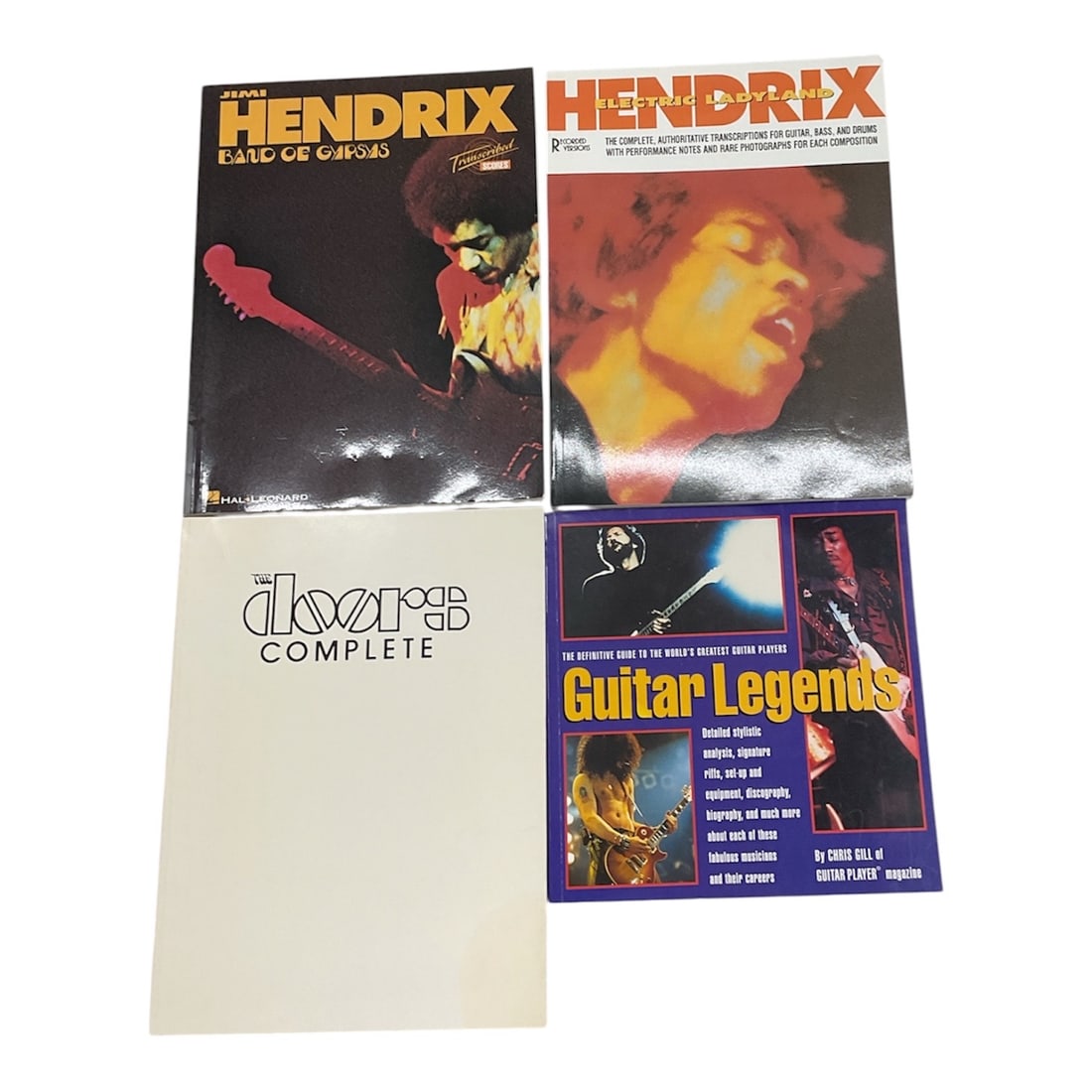 Collection of Four Rock Sheet Music Books: This collection of four sheet music books features compositions by some of rock music's most influential artists. Included are two Jimi Hendrix songbooks, The Doors Complete