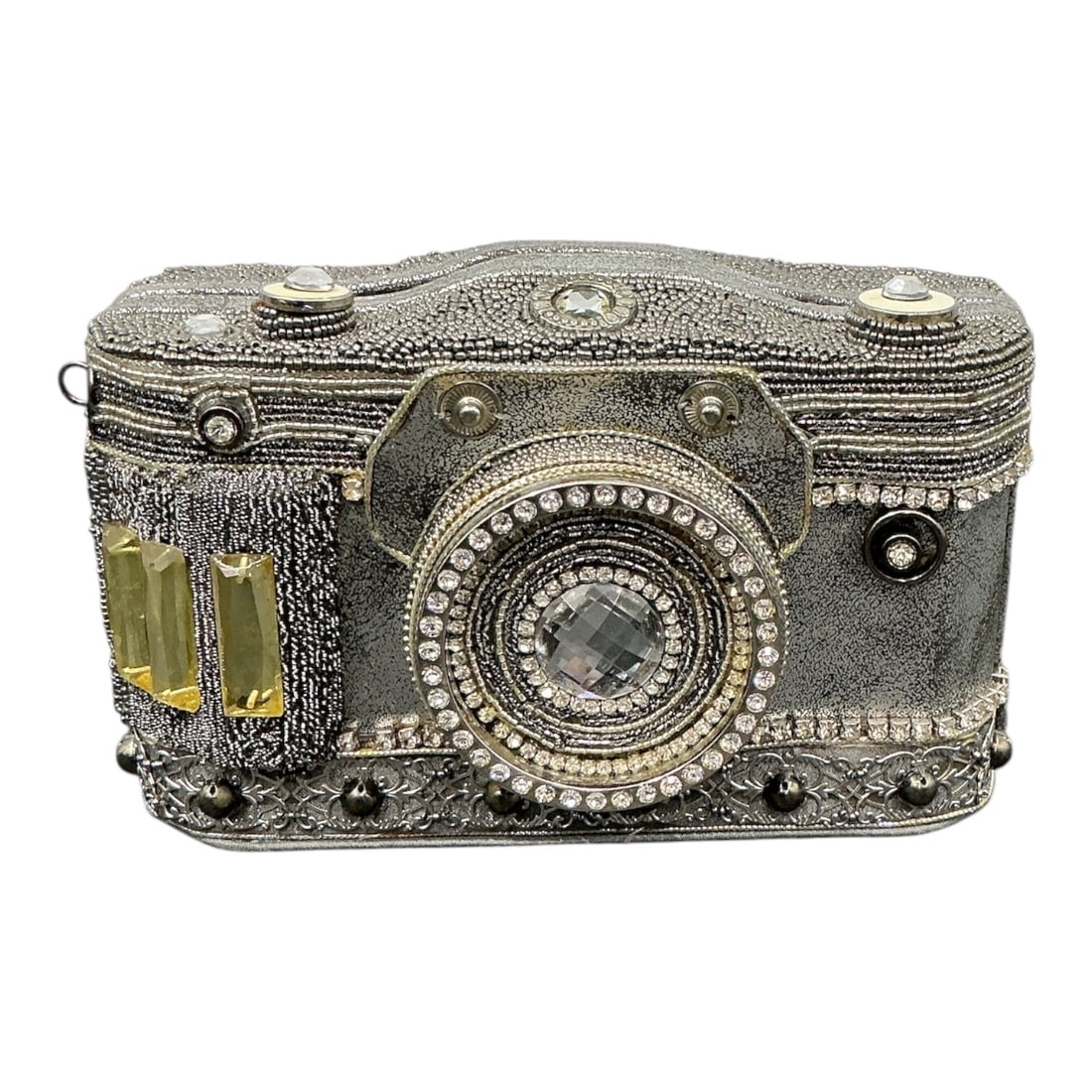 Mary Frances Embellished Camera Novelty Handbag: Mary Frances novelty shoulder handbag designed in the form of a vintage camera. Constructed with a metallic silver-tone exterior and extensively embellished with rhinestones, faux gemstones, and beadw