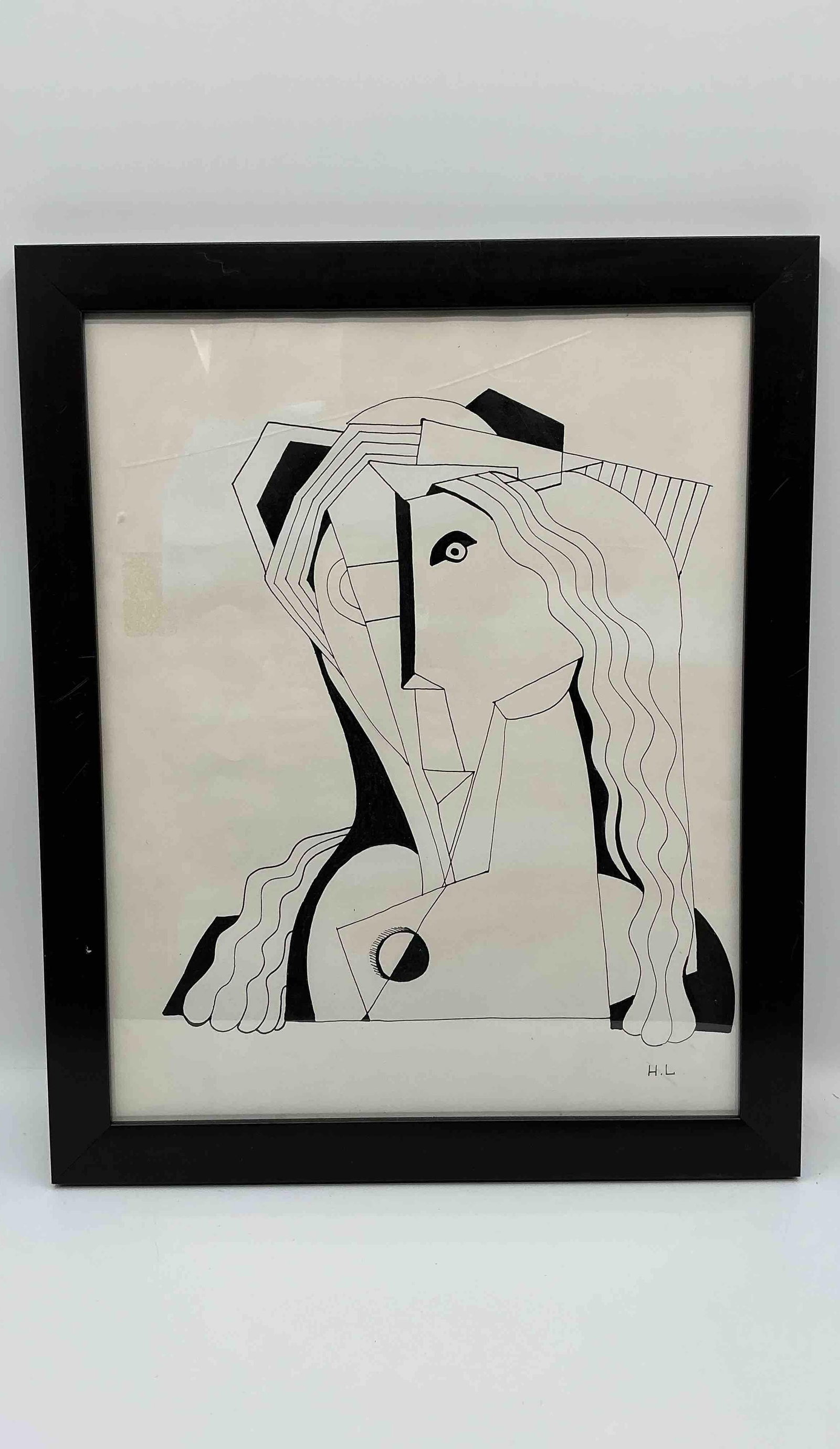 Henri Laurens (France, 1885-1954) Ink on Paper: Striking black-and-white cubist line drawing depicting a stylized female portrait with flowing hair and bold geometric forms. Signed in the bottom right H.L in black ink. 22x18in Medium Ink on 
