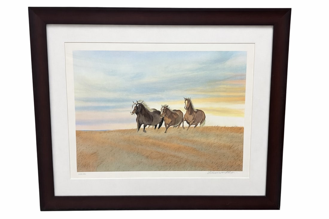 William Nelson Free with Frame Limited Edition Lithograph Framed 339/500: Limited edition lithograph titled Free with Frame by artist William Nelson. This expressive Western composition portrays three galloping horses moving powerfully across an open landscape beneath a sof
