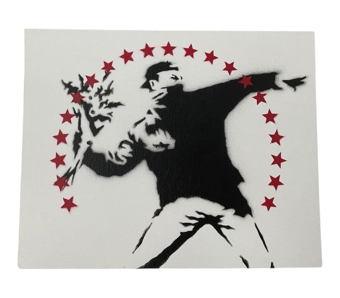 "Flower Thrower (Dismaland Edition)" by Banksy (UK, B.1974) Stencil and Mixed Media on Canvas: This souvenir work features one of Banksy's most recognizable motifs, the masked militant poised to throw a bouquet of flowers, here encircled by a halo of red stars. The piece was produced for th