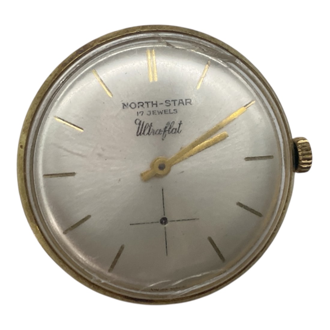 Vintage North-Star "Ultraflat" 17 Jewels Wristwatch: This is a vintage North-Star "Ultraflat" mechanical wristwatch featuring a minimalist, mid-century modern aesthetic. The watch features a sunburst silver-tone dial detailed with slender, gol