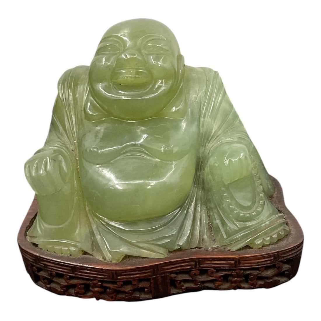 Oriental Green Stone Carving Figural Chieftain Sculpture: A finely detailed African-style full-figure sculpture hand-carved from a single piece of solid mineral, executed as an oriental green stone carving. The piece depicts a seated chieftain or ancestral f