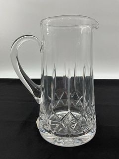 Vintage Atlantis Fatima Style Clear Cut Crystal Water Pitcher: This fine vintage clear cut crystal pitcher showcasing an elegant cylindrical silhouette with a sturdy integrated C-shaped pouring handle. The body exhibits a brilliant traditional pattern featuring d