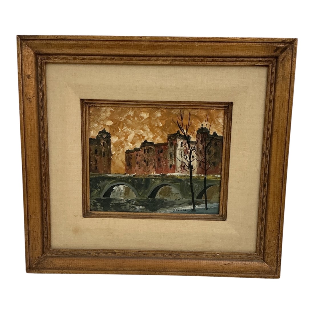 European Cityscape with Stone Bridge by Bernaro Oil on Board: An original mid-century oil painting on board depicting a European riverside city scene, signed "Bissaro" in the lower right corner. The expressionistic composition features a multi-arched s