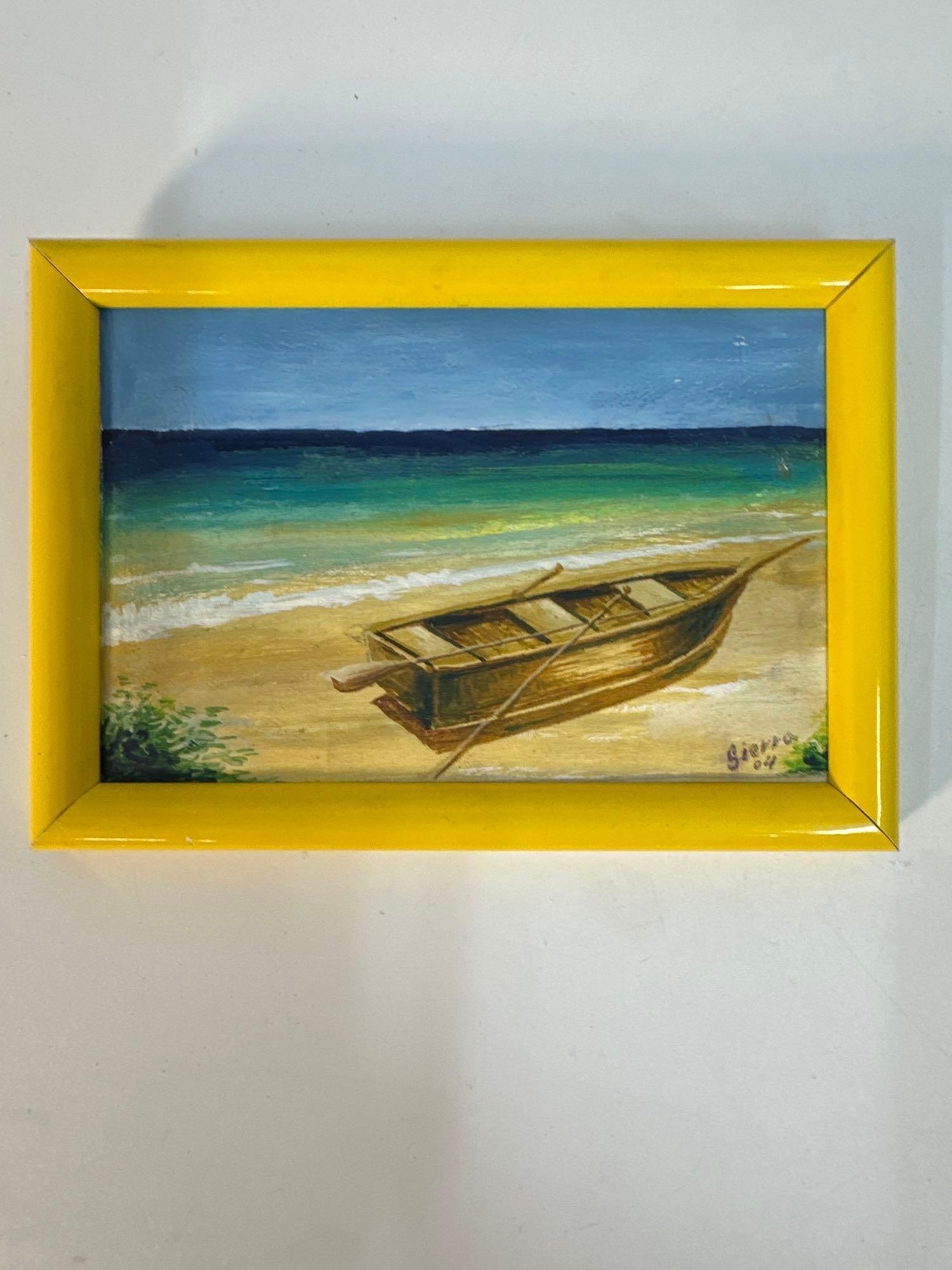 "Coastal Serenity" by Sierra (Cuban): This tranquil painting by Cuban artist Sierra depicts a peaceful coastal scene with a wooden boat resting on a sandy beach. The gentle waves and gradient of blues in the water create a soothing and in