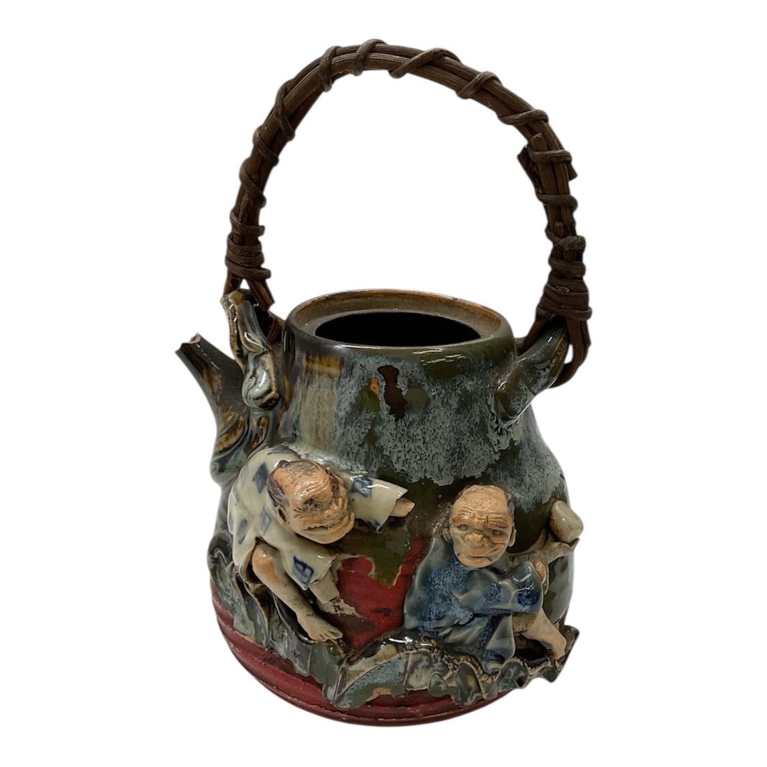 Japaneae Sumida Ware Figural Teapot with Elder Figures: Glazed ceramic teapot in the Sumida ware style, featuring applied figural decoration of two elderly figures in traditional dress. The vessel displays characteristic flowing, mottled glazes in blue, gr