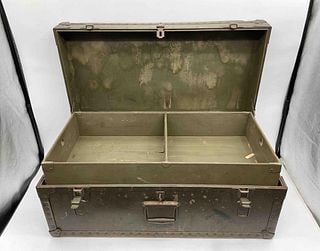 Vintage Vietnam Military Green Metal Storage Trunk: Heavyduty metal storage trunk in olive drab green with latches and central handle, likely mid20th century military or field issue. Interior includes a removable divided tray. Shows agerelated wear